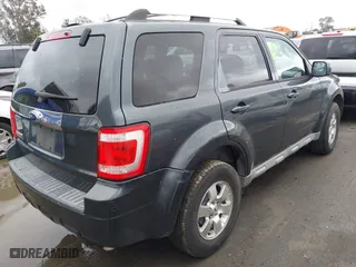 2009 Ford Escape Limited with VIN 1FMCU04759KB64236, listed as a IAAI auction lot 41796461 with 214,949 mi miles. Bid and sale history available at carsss.com. Image 4.