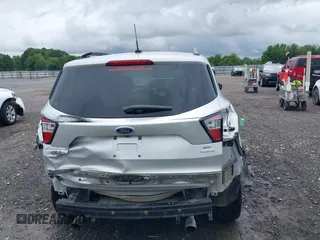 2018 Ford Escape SE с VIN 1FMCU0GD2JUC50470, выставлен на аукционе IAAI как лот 42172121 с пробегом 103 357 миль миль и . История ставок и продаж доступна на DreamBid. Изображение 17.