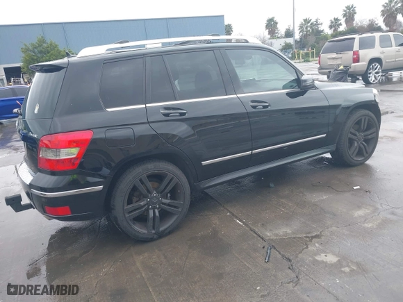 2012 Mercedes-Benz GLK-Class GLK 350 with VIN WDCGG8HB3CF912437, listed as a IAAI auction lot 41734683 with 127,572 mi miles. Bid and sale history available at carsss.com. Image 4.