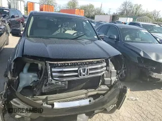 2013 Honda Pilot EX-L z VIN 5FNYF4H78DB033958, wystawiony jako Copart lot #56572484 z przebiegiem 190 797 mil mil oraz Nie do naprawy • Non repairable. Historia ofert i sprzedaży dostępna na DreamBid. Obrazek 11.