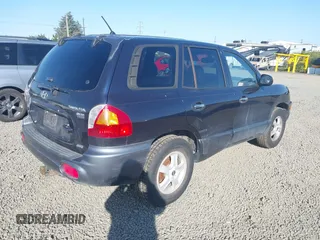 2004 Hyundai Santa Fe GLS with VIN KM8SC73E84U838268, listed as a IAAI auction lot 42030257 with 160,487 mi miles. Bid and sale history available at carsss.com. Image 4.