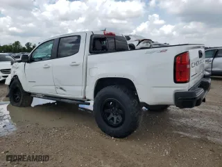 2021 Chevrolet Colorado 4WD ZR2 with VIN 1GCGTEEN0M1108190, listed as a Copart auction lot 54159655 with 64,447 mi miles and Salvage Title. Bid and sale history available at carsss.com. Image 2.