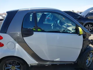 2014 Smart fortwo Pure z VIN WMEEJ3BA3EK741265, wystawiony jako IAAI lot #42185357 z przebiegiem 56 753 mil mil oraz . Historia ofert i sprzedaży dostępna na DreamBid. Obrazek 13.