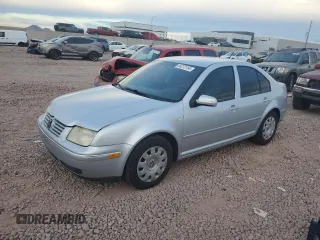 2004 Volkswagen Jetta GL with VIN 3VWRK69M54M000523, listed as a Copart auction lot 84272154 with 201,445 mi miles and Salvage title. Bid and sale history available at DreamBid. Image 1.