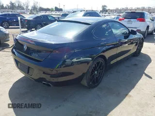2013 BMW 6 Series 650i with VIN WBAYM9C57DDW20178, listed as a IAAI auction lot 41933561 with 72,886 mi miles and . Bid and sale history available at carsss.com. Image 4.