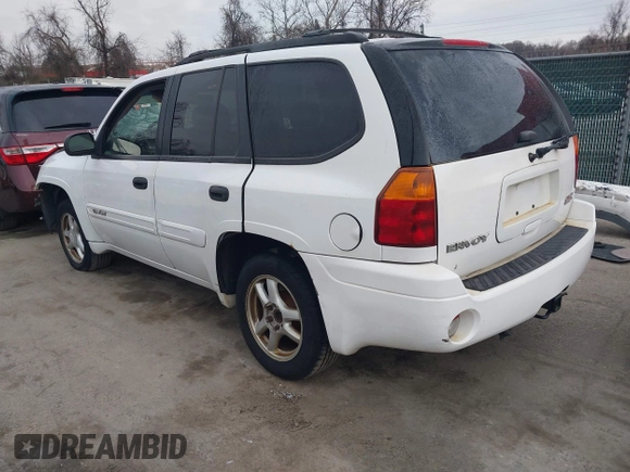 2005 GMC Envoy SLT with VIN 1GKDT13S952190876, listed as a IAAI auction lot 41308686 with 244,774 mi miles. Bid and sale history available at carsss.com. Image 3.