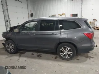 2017 Honda Pilot EX-L with VIN 5FNYF6H51HB080796, listed as a IAAI auction lot 40702843 with Not Provided miles and . Bid and sale history available at DreamBid. Image 13.