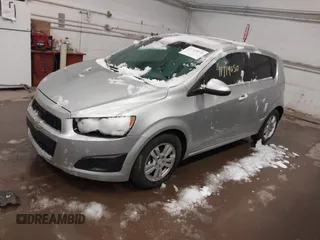 2014 Chevrolet Sonic LT with VIN 1G1JC6SB5E4234334, listed as a IAAI auction lot 41719050 with 118,755 mi miles. Bid and sale history available at carsss.com. Image 2.