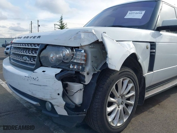 2011 Land Rover Range Rover SC with VIN SALMF1E4XBA331496, listed as a IAAI auction lot 41534410 with 144,402 mi miles. Bid and sale history available at carsss.com. Image 6.