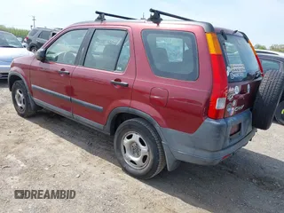 2004 Honda CR-V LX with VIN SHSRD68474U203411, listed as a IAAI auction lot 42125517 with 185,000 mi miles and . Bid and sale history available at carsss.com. Image 3.