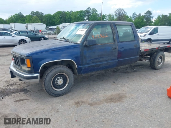 2000 GMC Sierra 3500 z VIN 1GTGC33R1YF502154, wystawiony jako IAAI lot #42183662 z przebiegiem 157 504 mil mil oraz . Historia ofert i sprzedaży dostępna na DreamBid. Obrazek 2.