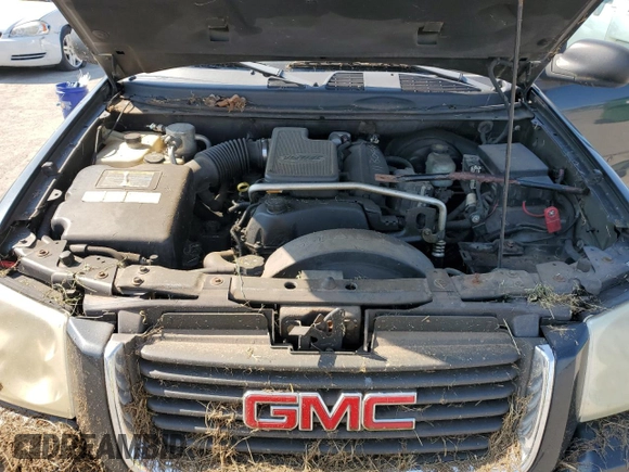 2004 GMC Envoy SLT with VIN 1GKDT13SX42423677, listed as a Copart auction lot 69012884 with Not Provided miles and Clean Title. Bid and sale history available at carsss.com. Image 12.
