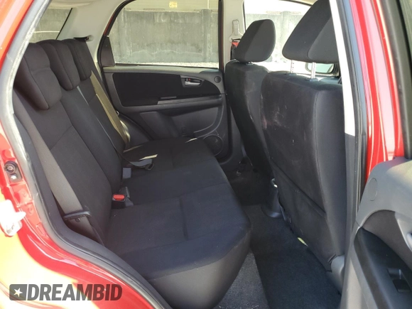 2010 Suzuki SX4 z VIN JS2YA5A32A6300486, wystawiony jako Copart lot #52340575 z przebiegiem 200 190 mil mil oraz Szkody całkowita. Historia ofert i sprzedaży dostępna na DreamBid. Obrazek 11.