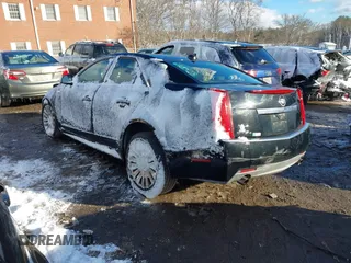 2010 Cadillac CTS Performance with VIN 1G6DL5EV4A0109706, listed as a IAAI auction lot 41355556 with 239,748 mi miles. Bid and sale history available at carsss.com. Image 3.