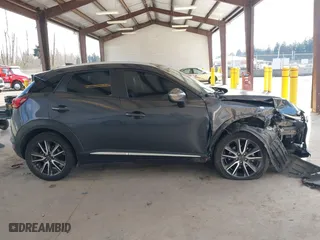 2017 Mazda CX-3 Grand Touring with VIN JM1DKFD70H0150496, listed as a IAAI auction lot 41746038 with 108,091 mi miles. Bid and sale history available at carsss.com. Image 14.