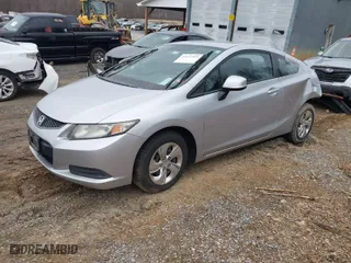 2013 Honda Civic Cpe LX with VIN 2HGFG3A59DH518192, listed as a IAAI auction lot 41652389 with 138,257 mi miles. Bid and sale history available at carsss.com. Image 2.