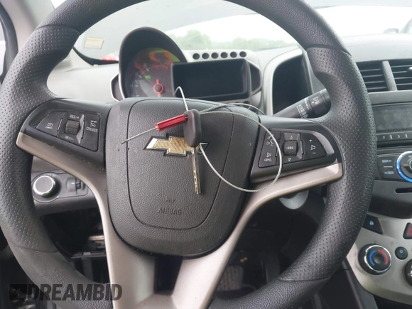 2014 Chevrolet Sonic LT with VIN 1G1JC5SH8E4168554, listed as a IAAI auction lot 42129823 with 276,709 mi miles and . Bid and sale history available at DreamBid. Image 11.