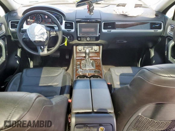 2013 Volkswagen Touareg Exec z VIN WVGEF9BPXDD007602, wystawiony jako Copart lot #50031785 z przebiegiem 93 859 mil mil oraz Szkody całkowita. Historia ofert i sprzedaży dostępna na DreamBid. Obrazek 8.