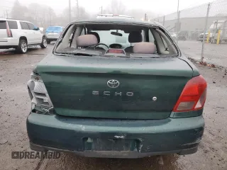 2000 Toyota ECHO with VIN JTDAT1231Y0041399, listed as a Copart auction lot 83774514 with 128,465 mi miles and Salvage Title. Bid and sale history available at DreamBid. Image 6.