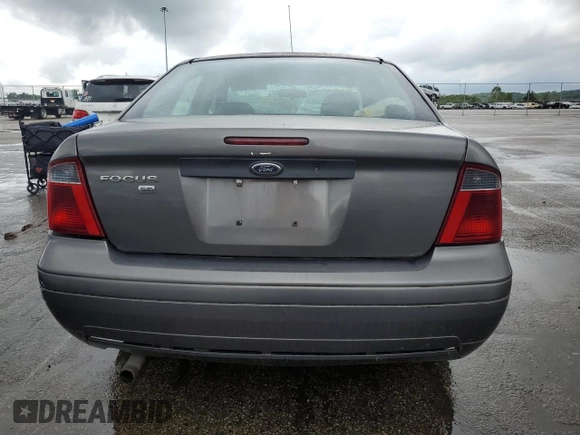 2007 Ford Focus S z VIN 1FAHP34N27W144992, wystawiony jako Copart lot #65571385 z przebiegiem 194 933 mil mil oraz Szkoda całkowita • Salvage title. Historia ofert i sprzedaży dostępna na DreamBid. Obrazek 6.