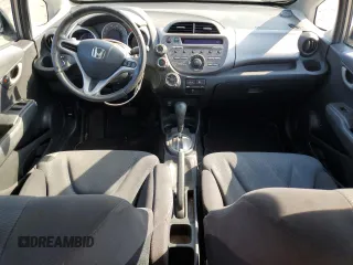 2010 Honda Fit Sport with VIN JHMGE8H47AS023964, listed as a Copart auction lot 61797995 with 78,518 mi miles and Salvage title. Bid and sale history available at DreamBid. Image 8.