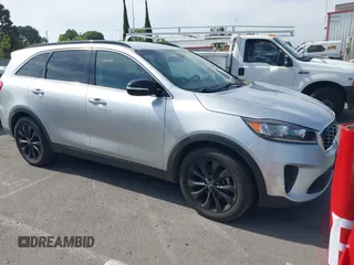 2019 Kia Sorento LX z VIN 5XYPG4A51KG594221, wystawiony jako IAAI lot #42292617 z przebiegiem 124 132 mil mil oraz . Historia ofert i sprzedaży dostępna na DreamBid. Obrazek 1.