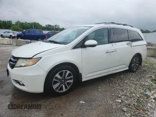 2014 Honda Odyssey Touring z VIN 5FNRL5H95EB083772, wystawiony jako Copart lot #56713525 z przebiegiem 215 833 mil mil oraz Szkoda całkowita • Salvage title. Historia ofert i sprzedaży dostępna na DreamBid. Obrazek 1.