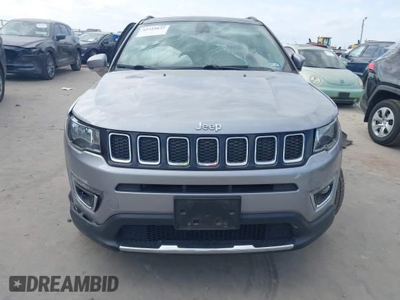 2018 Jeep Compass Limited with VIN 3C4NJCCBXJT499864, listed as a IAAI auction lot 42319832 with 94,893 mi miles and . Bid and sale history available at DreamBid. Image 11.