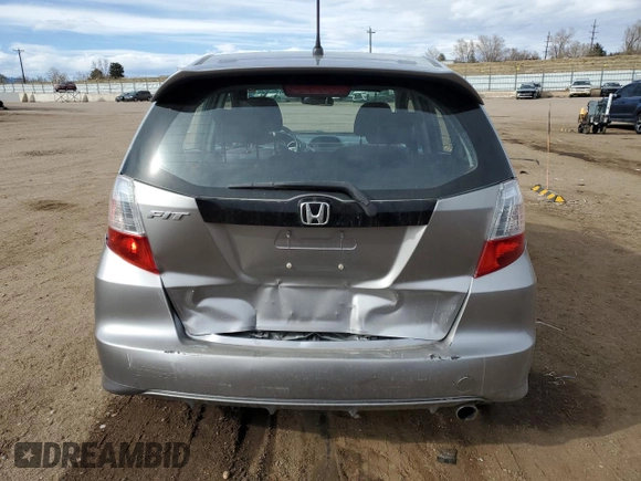 2010 Honda Fit Sport with VIN JHMGE8G41AC033885, listed as a Copart auction lot 49793605 with 114,910 mi miles and Salvage title. Bid and sale history available at DreamBid. Image 6.
