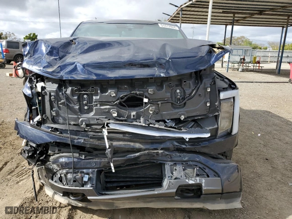 2022 Ford F-150 Lightning Pro with VIN 1FT6W1EV8NWG04113, listed as a Copart auction lot 51413924 with 0 mi miles and Salvage Title. Bid and sale history available at carsss.com. Image 5.