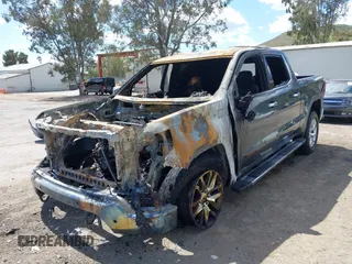 2019 GMC Sierra 1500 SLT z VIN 3GTP8DED1KG229179, wystawiony jako IAAI lot #41932481 z przebiegiem Nie podano mil oraz . Historia ofert i sprzedaży dostępna na DreamBid. Obrazek 17.