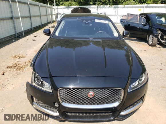 2016 Jaguar XF 35t Prestige with VIN SAJBE4BV9GCY07850, listed as a Copart auction lot 65637874 with 137,148 mi miles and Salvage Title. Bid and sale history available at carsss.com. Image 5.