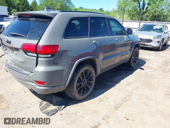 2019 Jeep Grand Cherokee Laredo E with VIN 1C4RJFAG8KC849782, listed as a IAAI auction lot 42151331 with 141,099 mi miles and . Bid and sale history available at DreamBid. Image 4.