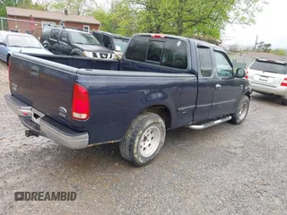 1999 Ford F-150 with VIN 1FTRX17W5XNA06036, listed as a IAAI auction lot 41897561 with 222,979 mi miles and . Bid and sale history available at DreamBid. Image 4.