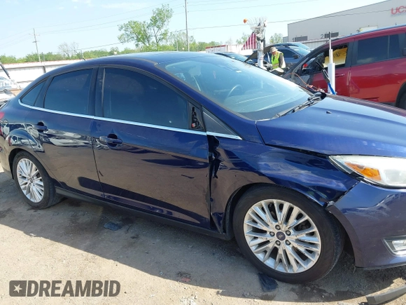 2017 Ford Focus Titanium with VIN 1FADP3J29HL204892, listed as a IAAI auction lot 42032705 with 119,028 mi miles and . Bid and sale history available at DreamBid. Image 14.