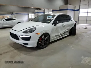 2013 Porsche Cayenne GTS with VIN WP1AD2A24DLA76344, listed as a Copart auction lot 83570884 with 63,704 mi miles and Salvage Title. Bid and sale history available at DreamBid. Image 1.