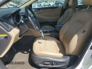 2013 Hyundai Sonata with VIN KMHEC4A4XDA085186, listed as a Copart auction lot 54975385 with 129,053 mi miles and Clean Title. Bid and sale history available at carsss.com. Image 7.