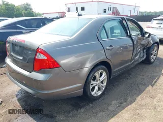 2012 Ford Fusion SE with VIN 3FAHP0HAXCR390109, listed as a IAAI auction lot 42470688 with 105,837 mi miles and . Bid and sale history available at DreamBid. Image 4.