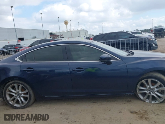 2017 Mazda Mazda6 Touring with VIN JM1GL1V54H1107722, listed as a IAAI auction lot 41521257 with 142,129 mi miles. Bid and sale history available at carsss.com. Image 14.
