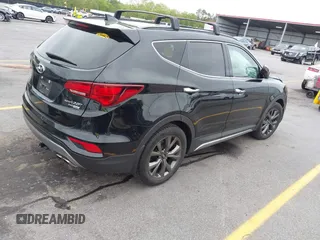 2018 Hyundai Santa Fe Ultimate with VIN 5XYZWDLA6JG570808, listed as a IAAI auction lot 41941878 with 47,391 mi miles and . Bid and sale history available at DreamBid. Image 4.