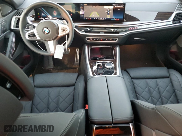 2025 BMW X6 xDrive40i with VIN 5UX33EX09S9Y26463, listed as a Copart auction lot 84269334 with 1,970 mi miles and Salvage Title. Bid and sale history available at carsss.com. Image 8.