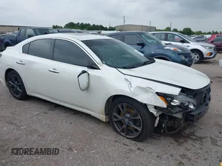2014 Nissan Maxima S with VIN 1N4AA5AP6EC908751, listed as a IAAI auction lot 42624511 with 141,544 mi miles and . Bid and sale history available at DreamBid. Image 1.