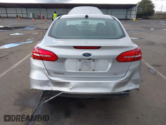 2016 Ford Focus SE with VIN 1FADP3F25GL384296, listed as a IAAI auction lot 41765750 with 158,695 mi miles. Bid and sale history available at carsss.com. Image 6.