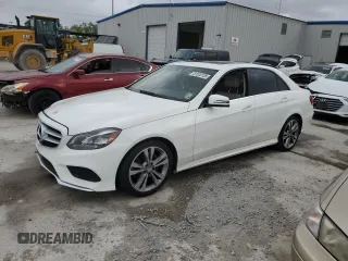 2014 Mercedes-Benz E-Class E 350 Sport with VIN WDDHF5KB4EA902784, listed as a Copart auction lot 51520135 with 142,429 mi miles and Salvage Title. Bid and sale history available at carsss.com. Image 1.