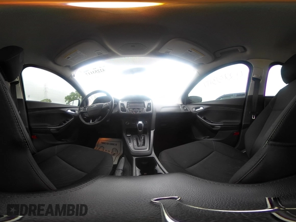 2016 Ford Focus SE with VIN 1FADP3F21GL288553, listed as a IAAI auction lot 42253117 with 107,727 mi miles and . Bid and sale history available at DreamBid. Image 20.