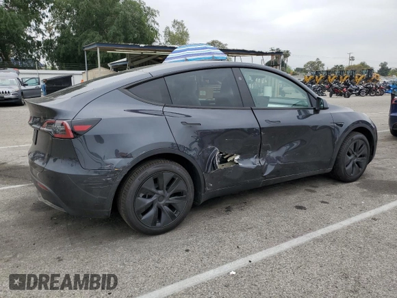 2025 Tesla Model Y Long Range with VIN 7SAYGDED8SF277469, listed as a Copart auction lot 45600195 with 442 mi miles and Salvage Title. Bid and sale history available at DreamBid. Image 3.