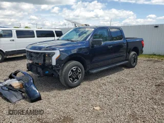 2022 Ford F-150 Lightning Pro z VIN 1FTVW1EL6NWG04931, wystawiony jako Copart lot #59096435 z przebiegiem 26 616 mil mil oraz Szkody całkowita. Historia ofert i sprzedaży dostępna na DreamBid. Obrazek 1.