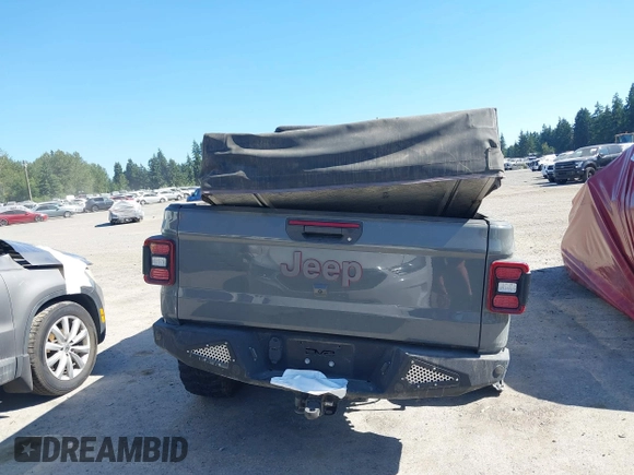 2023 Jeep Gladiator Rubicon with VIN 1C6JJTBG6PL538859, listed as a IAAI auction lot 42633055 with 22,899 mi miles and . Bid and sale history available at DreamBid. Image 17.