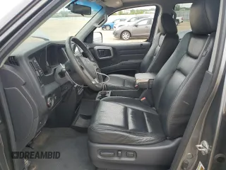 2009 Honda Ridgeline RTL z VIN 5FPYK16569B103645, wystawiony jako Copart lot #58300625 z przebiegiem 103 195 mil mil oraz Szkoda całkowita • Salvage title. Historia ofert i sprzedaży dostępna na DreamBid. Obrazek 7.