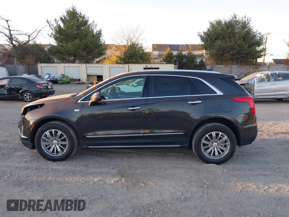 2017 Cadillac XT5 Luxury AWD with VIN 1GYKNDRS5HZ319787, listed as a IAAI auction lot 40819077 with 83,510 mi miles and . Bid and sale history available at DreamBid. Image 14.